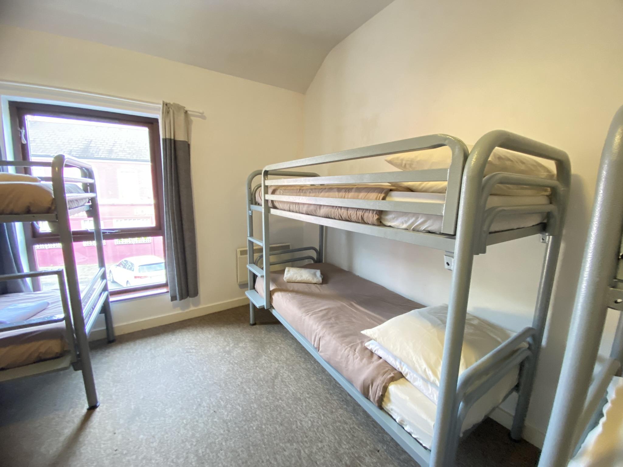 Family of five hostel-style room